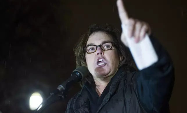FILE - Rosie O'Donnell speaks at a rally calling for resistance to President Donald Trump, in Lafayette Park in front of the White House in Washington, Feb. 28, 2017. (AP Photo/Cliff Owen, File)