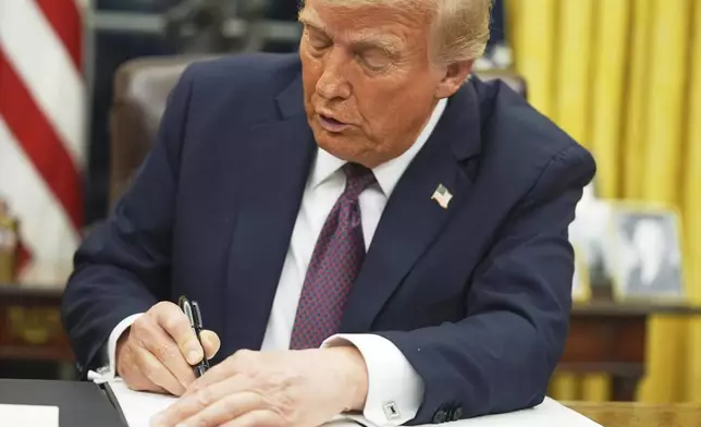FILE - President Donald Trump signs an executive order on birthright citizenship in the Oval Office of the White House in Washington, Jan. 20, 2025. (AP Photo/Evan Vucci, File)