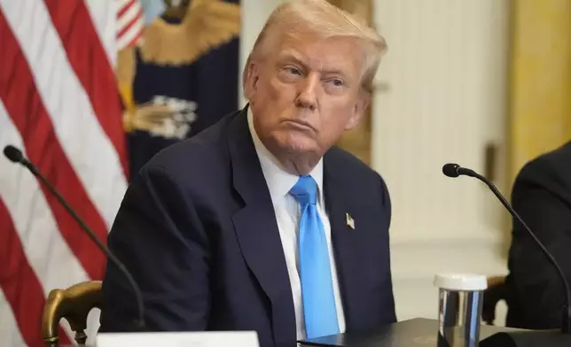 President Donald Trump listens at an event to promote his proposal to improve Americans' access to their medical records in the East Room of the White House, Wednesday, July 30, 2025, in Washington. (AP Photo/Mark Schiefelbein)