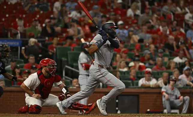 Washington Nationals' James Wood hits an RBI-single against the St. Louis Cardinals during the third inning of a baseball game, Tuesday, July 8, 2025, in St. Louis. (AP Photo/Jeff Le)