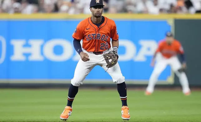Houston Astros second baseman Brice Matthews (28) stands ready during the first inning of a baseball game against the Texas Rangers, Friday, July 11, 2025, in Houston. (AP Photo/Kevin M. Cox)