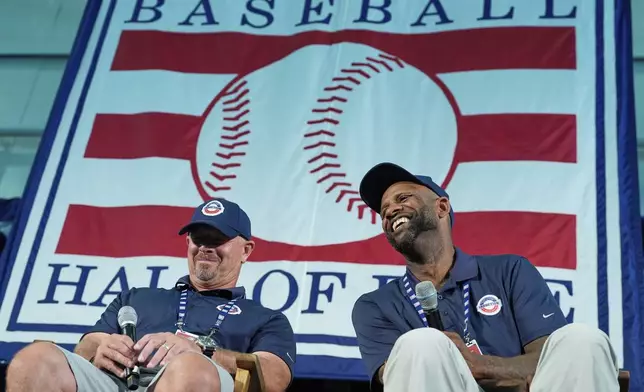 Baseball Hall of Fame inductees Billy Wagner, left, and CC Sabathia speak to reporters during a news conference in Cooperstown, N.Y., Saturday, July 26, 2025. (AP Photo/Seth Wenig)