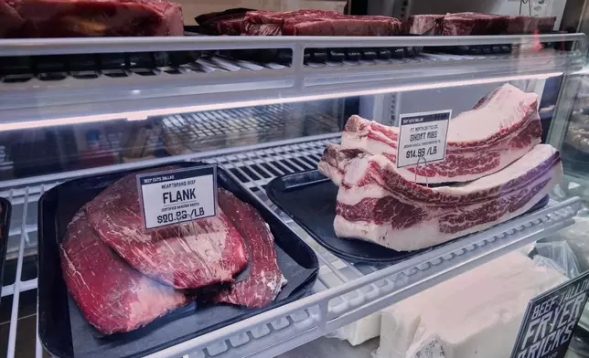Different cuts of beef sit in the display case at Deep Cuts Dallas Butcher Shop, Thursday, July 24, 2025, in Dallas. (AP Photo/Tony Gutierrez)