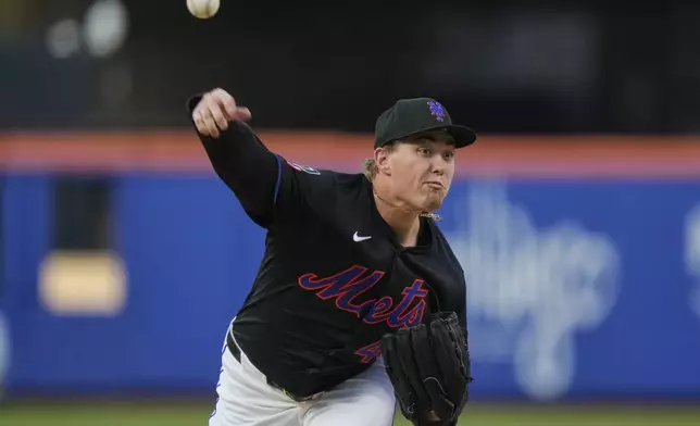 New York Mets' Blade Tidwell pitches dsecond inning in the second baseball game against the Milwaukee Brewers of a doubleheader Wednesday, July 2, 2025, in New York. (AP Photo/Frank Franklin II)