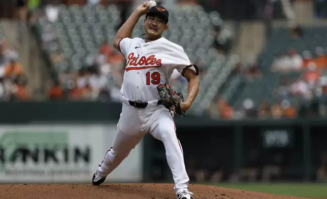 Baltimore Orioles pitcher Tomoyuki Sugano throws during the first inning of a baseball game against the Colorado Rockies in Baltimore, Sunday, July 27, 2025. (AP Photo/Terrance Williams)
