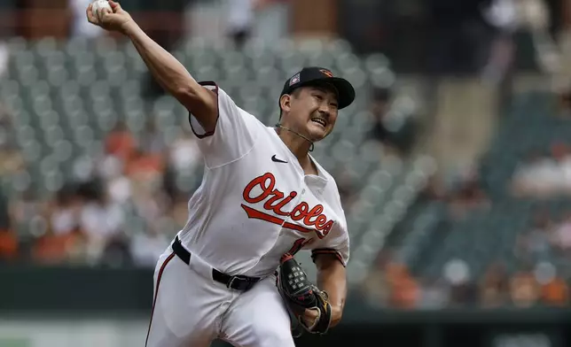 Baltimore Orioles pitcher Tomoyuki Sugano throws during the first inning of a baseball game against the Colorado Rockies in Baltimore, Sunday, July 27, 2025. (AP Photo/Terrance Williams)