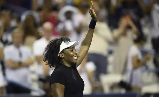 Venus Williams waves to the crowd as she celebrates her win over Peyton Stearns during a match at the Citi Open tennis tournament Tuesday, July 22, 2025, in Washington. (AP Photo/Nick Wass)