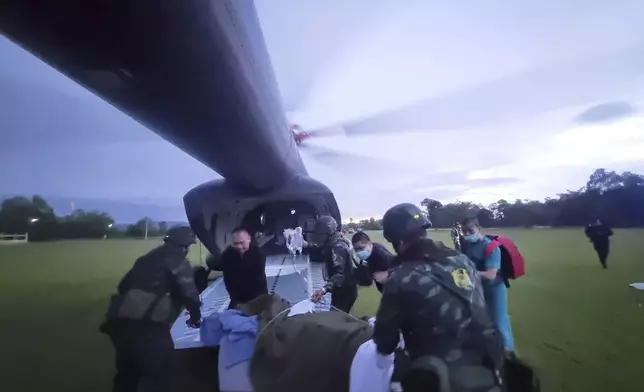 This photo released by the Royal Thai Army, shows an injured Thai soldier who stepped on a land mine being airlifted to a hospital in Ubon Ratchathani province, Thailand, Wednesday, July 23, 2025. (The Royal Thai Army via AP)