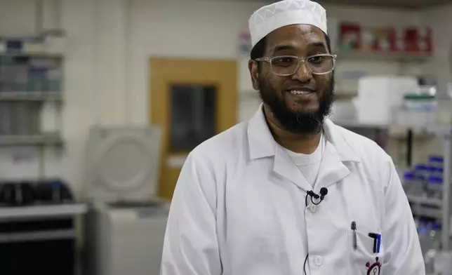 Professor Abdullah Ely speaks to the Associated Press, at the Wits laboratory Antiviral Gene Therapy Research Unit, at University of the Witwatersrand Medical School, in Johannesburg, South Africa, Thursday, May 22, 2025. (AP Photo/Themba Hadebe)