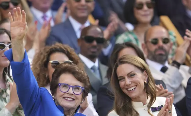 Britain's Kate, Princess of Wales sits next to tennis legend Billie Jean King in the Royal Box on Centre Court ahead of the women's singles final at the Wimbledon Tennis Championships in London, Saturday, July 12, 2025. (AP Photo/Kin Cheung)