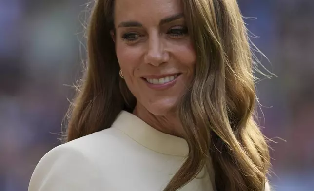 Kate, Princess of Wales participates in the presentation ceremony for the women's singles final at the Wimbledon Tennis Championships in London, Saturday, July 12, 2025. (AP Photo/Kin Cheung)