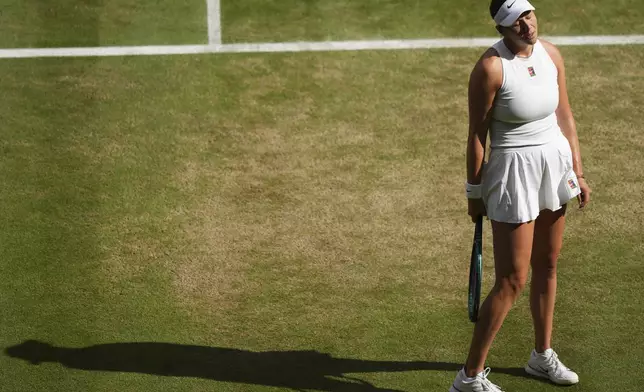 Amanda Anisimova of the U.S. reacts during the women's singles final match against Iga Swiatek of Poland at the Wimbledon Tennis Championships in London, Saturday, July 12, 2025.(AP Photo/Joanna Chan)