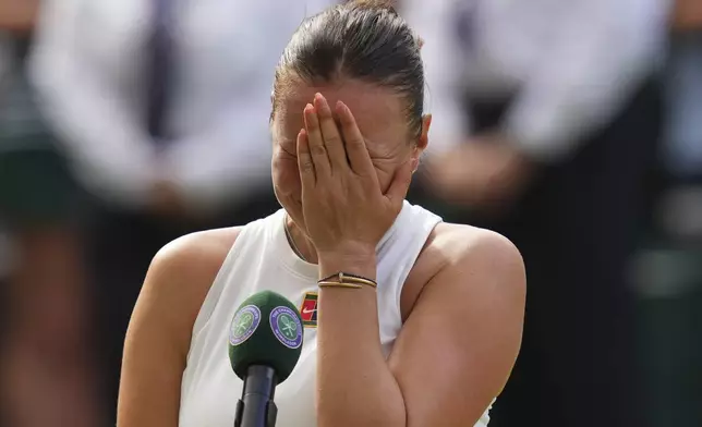 Amanda Anisimova of the U.S. reacts after losing the women's singles final match against Iga Swiatek of Poland at the Wimbledon Tennis Championships in London, Saturday, July 12, 2025.(AP Photo/Kirsty Wigglesworth)