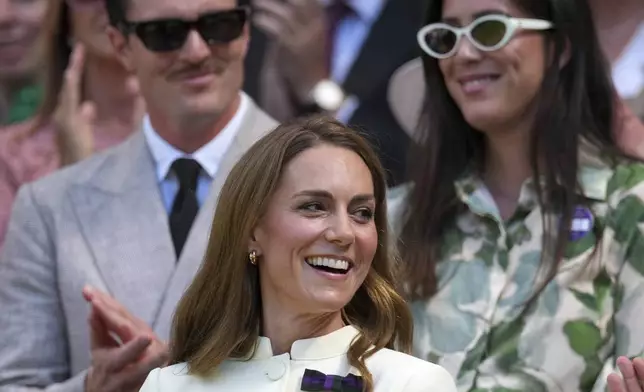 Britain's Kate, Princess of Wales smiles as she sits in the Royal Box on Centre Court ahead of the women's singles final at the Wimbledon Tennis Championships in London, Saturday, July 12, 2025. (AP Photo/Dave Shopland)