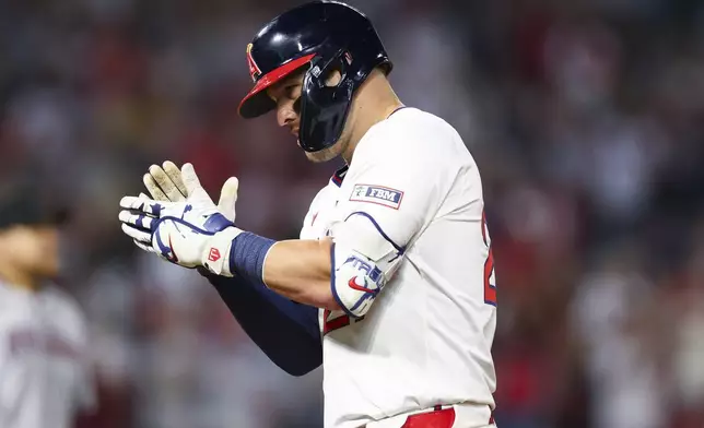Los Angeles Angels' Mike Trout celebrates after hitting an RBI single during the eighth inning of a baseball game against the Arizona Diamondbacks in Anaheim, Calif., Saturday, July 12, 2025. (AP Photo/Jessie Alcheh)
