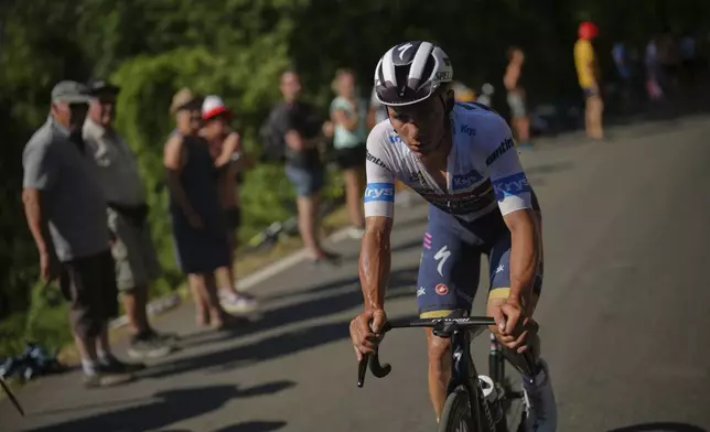 Belgium's Remco Evenepoel lost time in the twelfth stage of the Tour de France cycling race over 180.6 kilometers (112.2 miles) with start in Auch and finish in Hautacam, France, Thursday, July 17, 2025. (AP Photo/Thibault Camus)