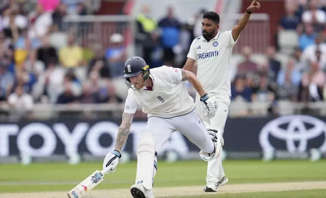 England's captain Ben Stokes run between the wickets to score during the fourth cricket test match between England and India at Emirates Old Trafford, Manchester, England, July 26, 2025.(AP Photo/Jon Super)