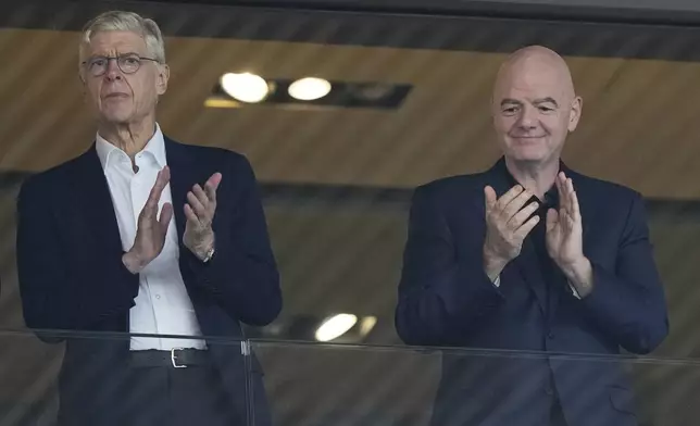 FIFA president Gianni Infantino, right, and Arsene Wenger, Chief Officer (FIFA) and former soccer coach arrive for the Women's Euro 2025 quarterfinals soccer match between Sweden and England at Stadion Letzigrund in Zurich, Switzerland, Thursday, July 17, 2025. (AP Photo/Martin Meissner)