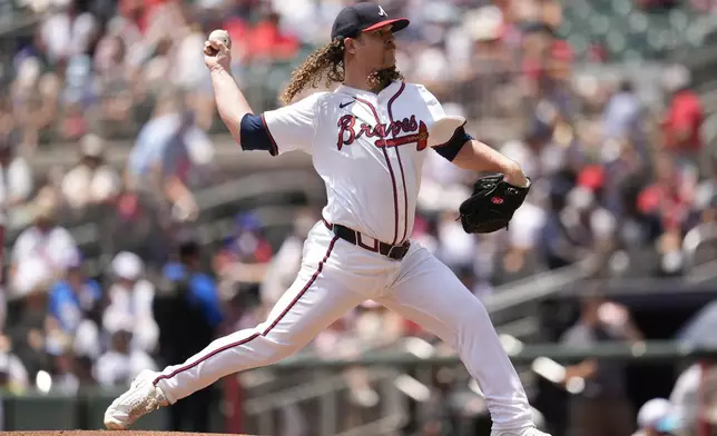 Atlanta Braves pitcher Grant Holmes (66) works in the first inning of a baseball game against the New York Yankees, Sunday, July 20, 2025, in Atlanta. (AP Photo/Mike Stewart)