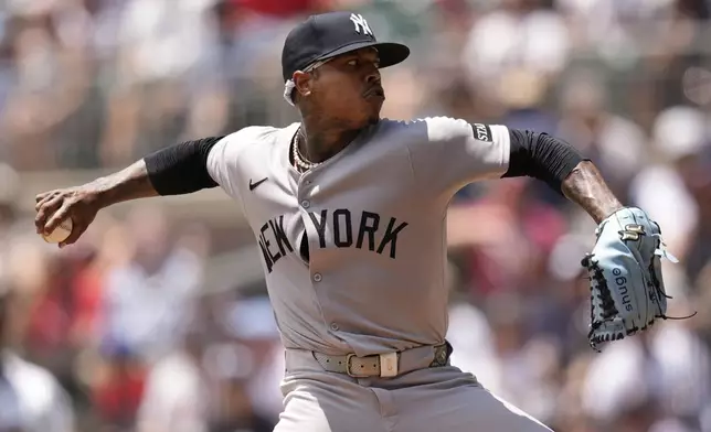 New York Yankees pitcher Marcus Stroman (0) works against the Atlanta Braves in the first inning of a baseball game, Sunday, July 20, 2025, in Atlanta. (AP Photo/Mike Stewart)