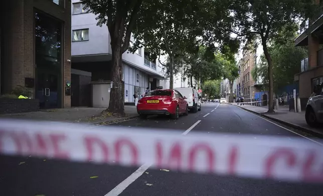 The scene in Southwark, south London, Monday, July 28, 2025, where four people were stabbed earlier today. (James ManningPA via AP)