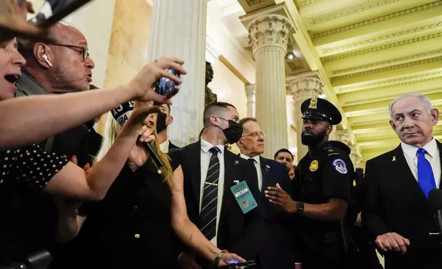 Israeli Prime Minister Benjamin Netanyahu speaks to reporters at the U.S. Capitol following a meeting with House Speaker Mike Johnson, R-La., Tuesday, July 8, 2025, in Washington. (AP Photo/Julia Demaree Nikhinson)