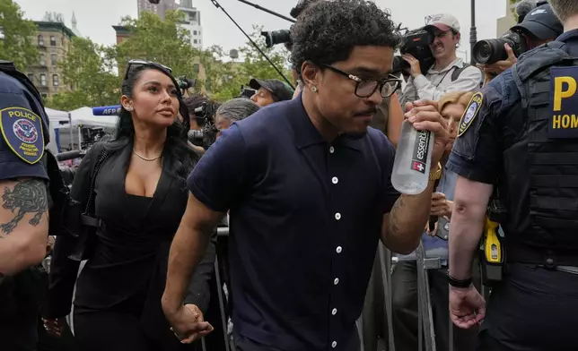 Justin Dior arrives back at Manhattan federal court after Sean "Diddy" Combs was convicted of prostitution-related offenses but acquitted of sex trafficking and racketeering charges that could have put one of hip-hop's most celebrated figures behind bars for life, Wednesday, July 2, 2025, in New York. (AP Photo/Yuki Iwamura)