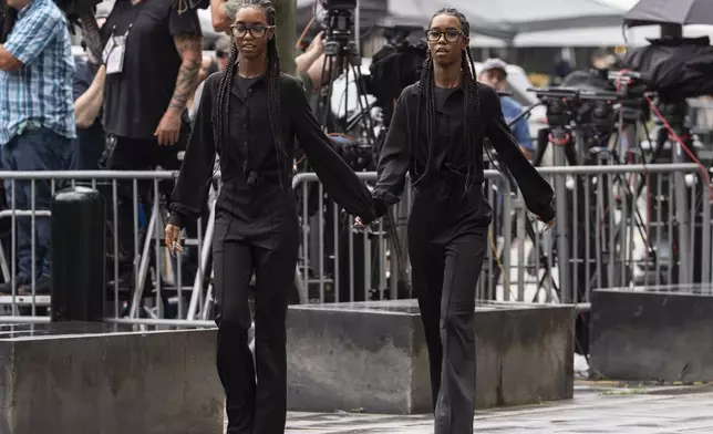 D'lila Combs and Jessie Combs, daughters of Sean “Diddy” Combs, arrive at court on Wednesday, July 2, 2025, in New York. (AP Photo/Yuki Iwamura)