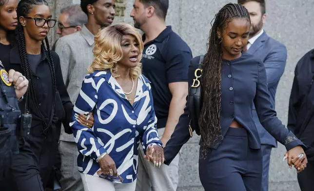 Janice Combs, center, mother of Sean "Diddy" Combs, leaves Manhattan federal court with her daughters Chance Combs, right, and Jessie Combs, after her son was denied bail on prostitution-related offenses but acquitted of sex trafficking and racketeering charges, Wednesday, July 2, 2025, in New York. (AP Photo/Stefan Jeremiah)