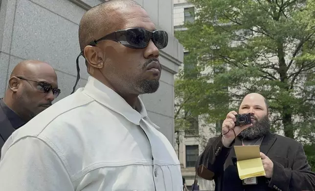 FILE - Ye, the rapper formerly known as Kanye West, leaves federal court during the trial of Sean "Diddy" Combs in New York, Friday, June 13, 2025. (AP Photo/Larry Neumeister, File)