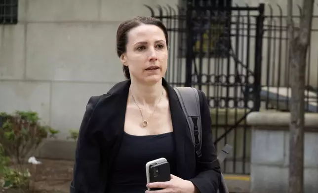 Prosecutor Christy Slavik enters court during the Sean "Diddy" Combs' sex trafficking trial on Monday, May 19, 2025. (AP Photo/Ted Shaffrey)