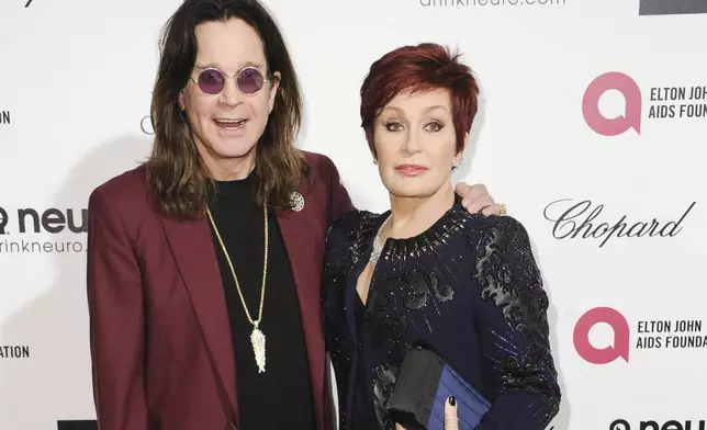 FILE - Ozzy Osbourne, left, and Sharon Osbourne arrive at the 87th Academy Awards Elton John AIDS Foundation Oscar Party on Feb. 22, 2015, in West Hollywood, Calif. (Photo by Richard Shotwell/Invision/AP, File)
