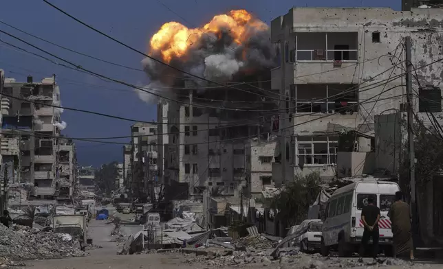 Smoke and flames erupt from an Israeli airstrike in Gaza City, Monday, July 21, 2025. (AP Photo/Jehad Alshrafi)