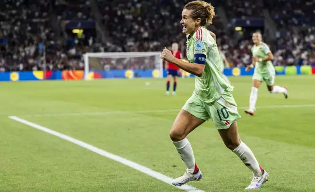 Italy's Cristiana Girelli celebrates after scoring the opening goal during the Women's Euro 2025 quarterfinals soccer match between Norway and Italy at Stade de Geneve in Geneva, Switzerland, Wednesday, July 16, 2025. (Martial Trezzini/Keystone via AP)