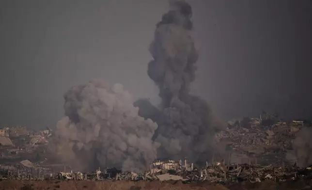 Smoke rises to the sky following an Israeli airstrike in the northern Gaza Strip as seen from southern Israel, Saturday, July 26, 2025. (AP Photo/Leo Correa)