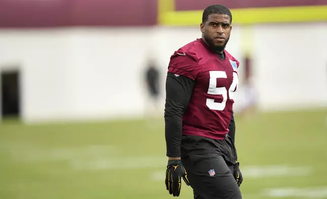 Washington Commanders linebacker Bobby Wagner (54) arrives practice at the team's NFL football training camp, Wednesday, July 23, 2025, in Ashburn, Va. (AP Photo/Mark Schiefelbein)