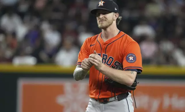 Houston Astros pitcher Josh Hader (71) reacts after defeating the Arizona Diamondbacks during a baseball game, Wednesday, July 23, 2025, in Phoenix. (AP Photo/Rick Scuteri)