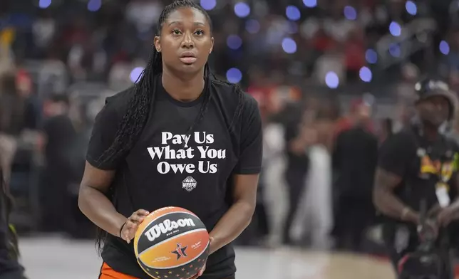 Indiana Fever's Aliyah Boston shoots before the WNBA All-Star basketball game, Saturday, July 19, 2025, in Indianapolis. (AP Photo/Michael Conroy)