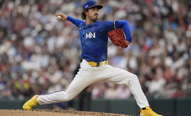 Minnesota Twins starting pitcher Joe Ryan delivers during the third inning of a baseball game against the Pittsburgh Pirates, Friday, July 11, 2025, in Minneapolis. (AP Photo/Abbie Parr)