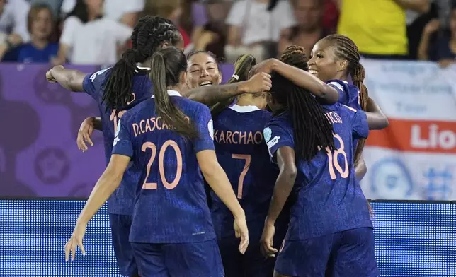 France players celebrate after Sandy Baltimore scored their second goal during the Euro 2025, group D, soccer match between France and England at Stadion Letzigrund in Zurich, Switzerland, Saturday, July 5, 2025. (AP Photo/Martin Meissner)