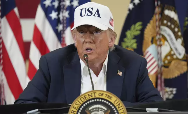 President Donald Trump speaks during a roundtable discussion with first responders and local officials at Hill Country Youth Event Center in Kerrville, Texas, during a tour to observe flood damage, Friday, July 11, 2025. (AP Photo/Jacquelyn Martin)