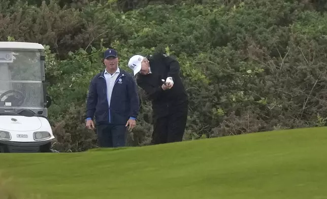 President Donald Trump plays golf at the Trump Turnberry golf course in Turnberry, Scotland, Saturday, July 26, 2025.(AP Photo/Alastair Grant)