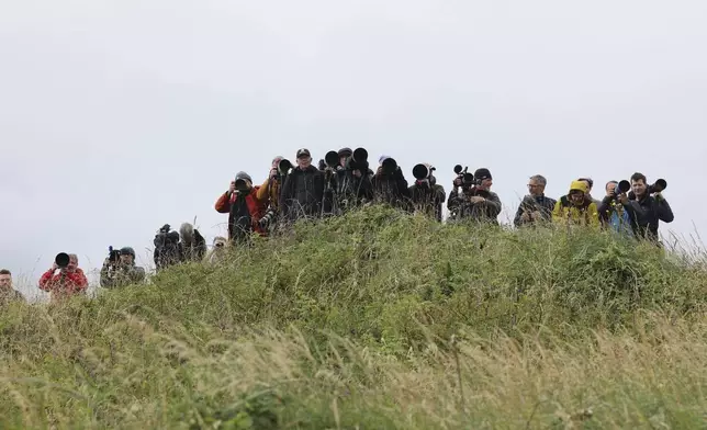 Members of the press at the Trump Turnberry golf course in South Ayrshire, Scotland, Saturday, July 26, 2025 as US President Donald Trump begins his five-day private trip to the country. (Robert Perry/PA via AP)