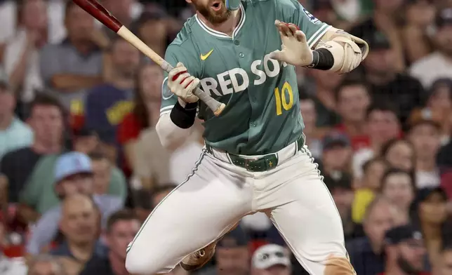 Boston Red Sox's Trevor Story side steps a pitch during the eighth inning of a baseball game against the Tampa Bay Rays, Friday, July 11, 2025, in Boston. (AP Photo/Mark Stockwell)
