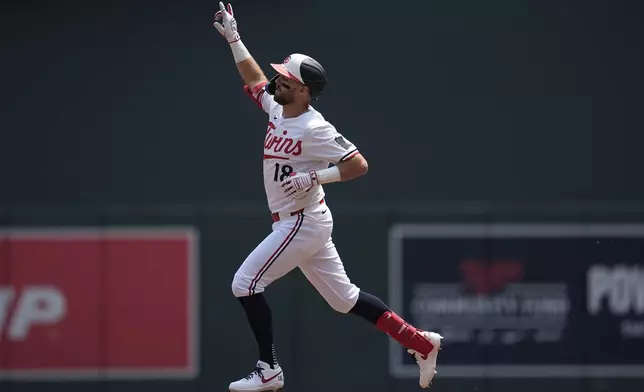Minnesota Twins' Kody Clemens (18) runs the bases after hitting a 3-run home run during the second inning of a baseball game against the Pittsburgh Pirates, Saturday, July 12, 2025, in Minneapolis. (AP Photo/Abbie Parr)