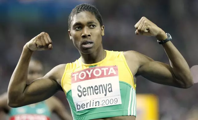 FILE -South Africa's Caster Semenya celebrates after winning the gold medal in the final of the Women's 800m during the World Athletics Championships in Berlin on Aug. 19, 2009. (AP Photo/Anja Niedringhaus, File)