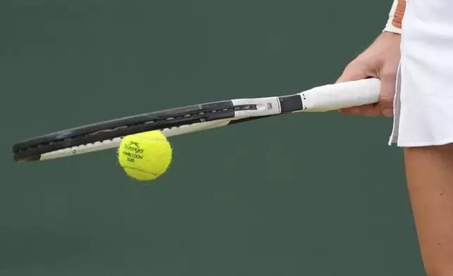 Liudmila Samsonova of Russia prepares to serve to Daria Kasatkina of Australia during a third round women's singles match at the Wimbledon Tennis Championships in London, Saturday, July 5, 2025. (AP Photo/Joanna Chan)