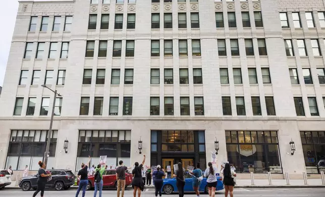Philadelphia municipal workers, AFSCME District Council 33, labor union that represents 911 operators strike outside police headquarters on Tuesday, July 1, 2025 in Philadelphia, Pa. (Alejandro A Alvarez /The Philadelphia Inquirer via AP)