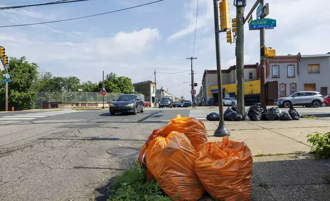 Trash sits on sidewalk at N. 6th and Allegheny Avenue on Tuesday, July 1, 2025 in Philadelphia, Pa. (Alejandro A Alvarez/The Philadelphia Inquirer via AP)