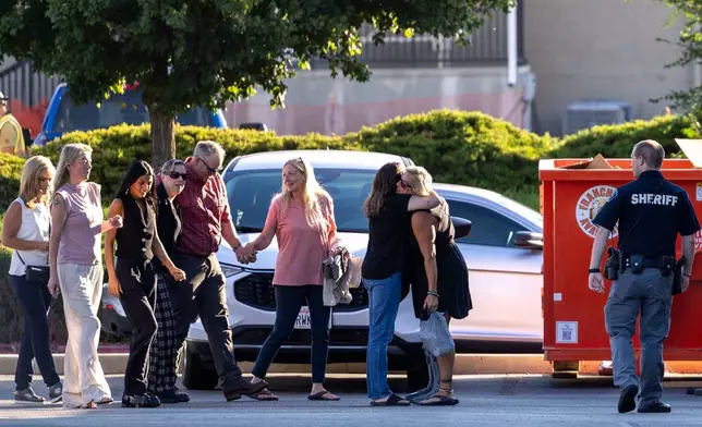 Family are escorted into the Ada County Courthouse for the Bryan Kohberger sentencing, Wednesday, July 23, 2025, in Boise, Idaho. (AP Photo/Drew Nash)